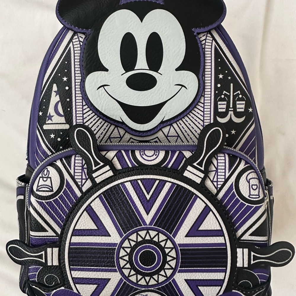 Glow in the dark Disney 100 Loungefly mini backpack
